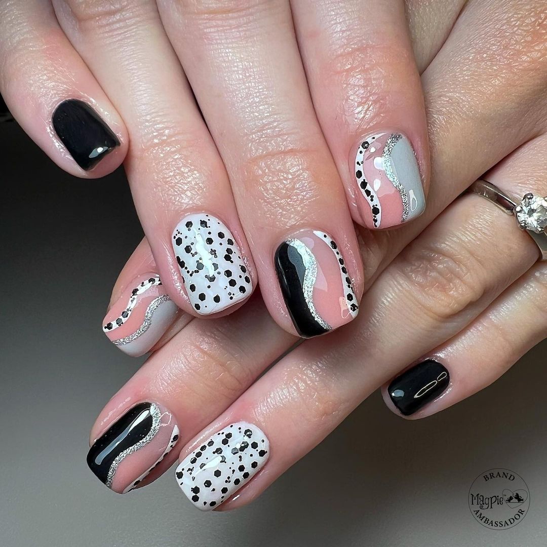 Black, pink, glitter and Dalmatian print nails