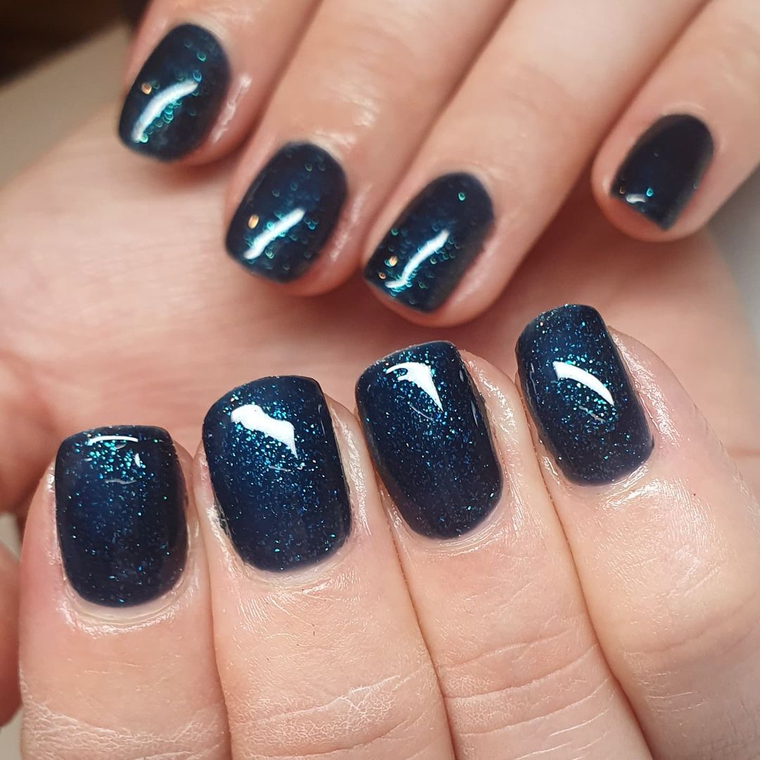 Navy glittery nails